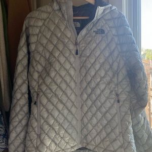 The North Face silver hooded jacket